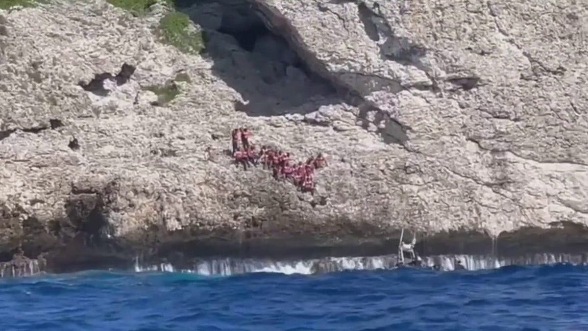 Coast Guard rescues 34 Haitians dumped by smugglers on Puerto Rico cliff