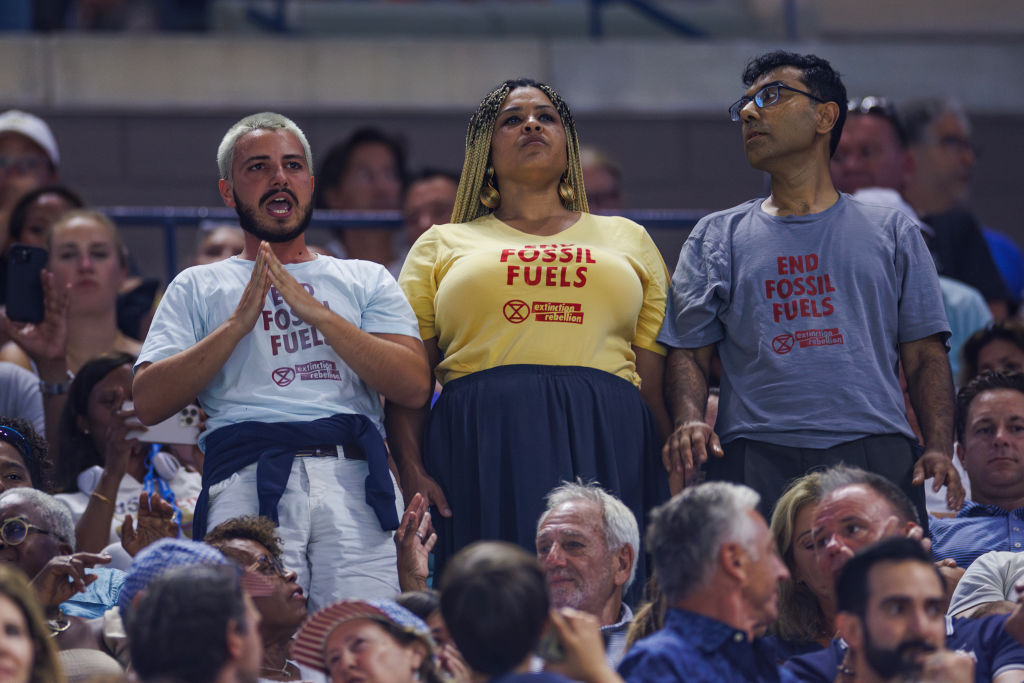 ‘You Suck’: Eco-Protesters Hold Up US Open Match, Glue Feet To The Floor