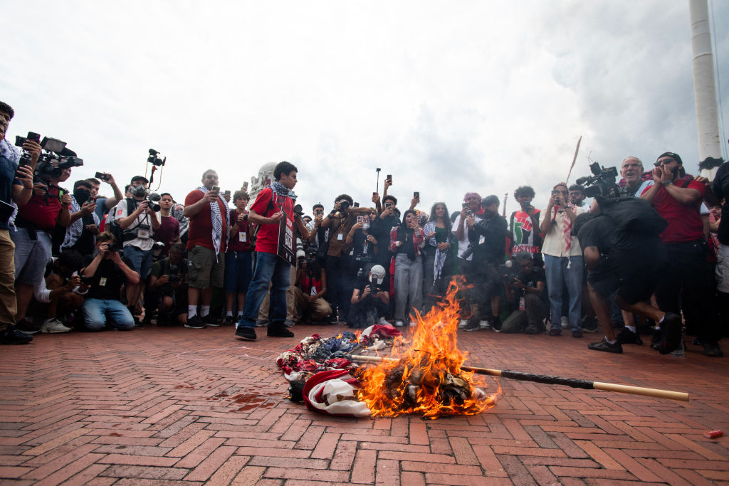 Republicans Raise American Flags, Recite Pledge Of Allegiance After Far-Left Protesters Tore Them Down, Burned Them