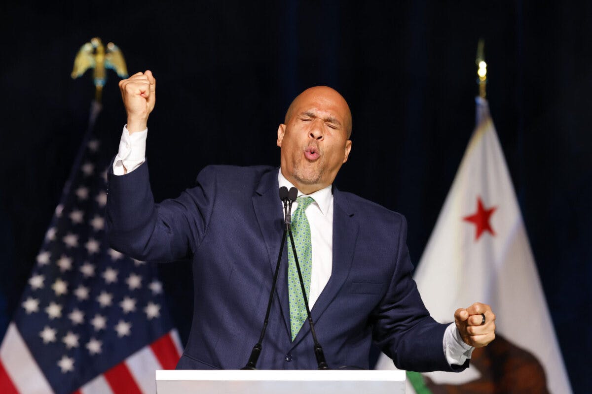 Hypocrisy Alert: Media Played Up ‘Nazi Salute’ Narrative Against Elon, Shrug At Cory Booker’s ‘Wave’