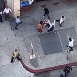 LA TERROR: Angry Thugs Brutally Beat, Kick and Stomp On Helpless Man for Several Minutes in Downtown Los Angeles (VIDEO)