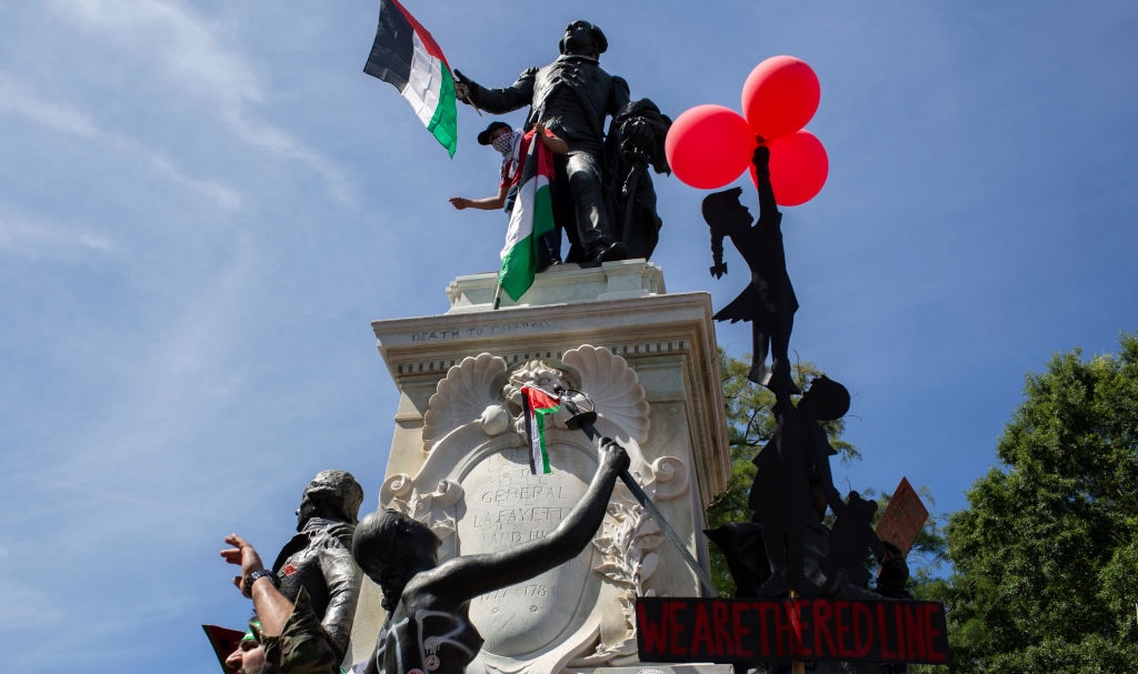 Protester In Hamas Garb Holds Up Bloody Biden Mask At Anti-Israel Rally In D.C.