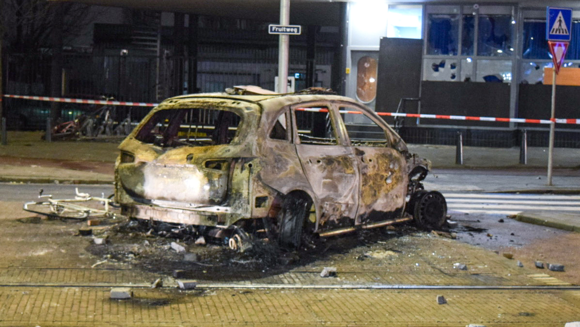 Warring African Migrant Groups Torch Police Cars
