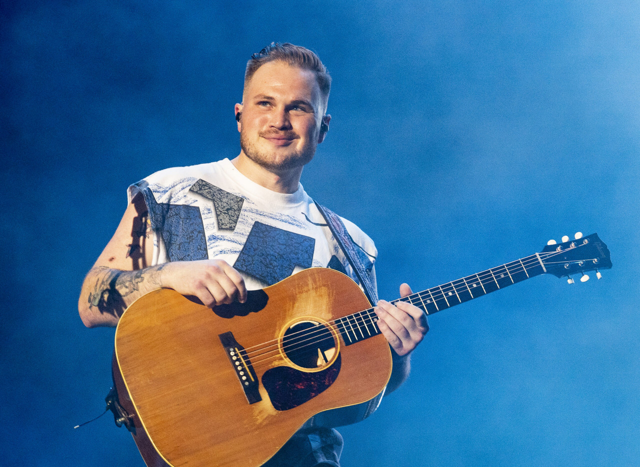 Country Star Zach Bryan Fulfills Promise To Late Mom