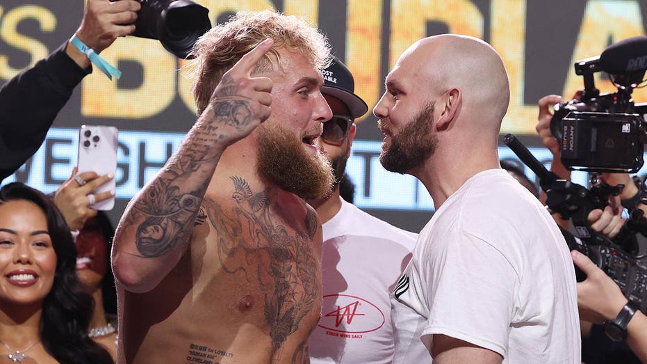 Jake Paul and his opponent's fans exchange explicit chants at weigh-in