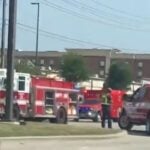 Allen Outlet Mall Shooter: Male, Dressed in Black, Wearing Tactical Gear with Likely Tattoo on His Hand – The Allen Mall Is a Gun-Free Zone