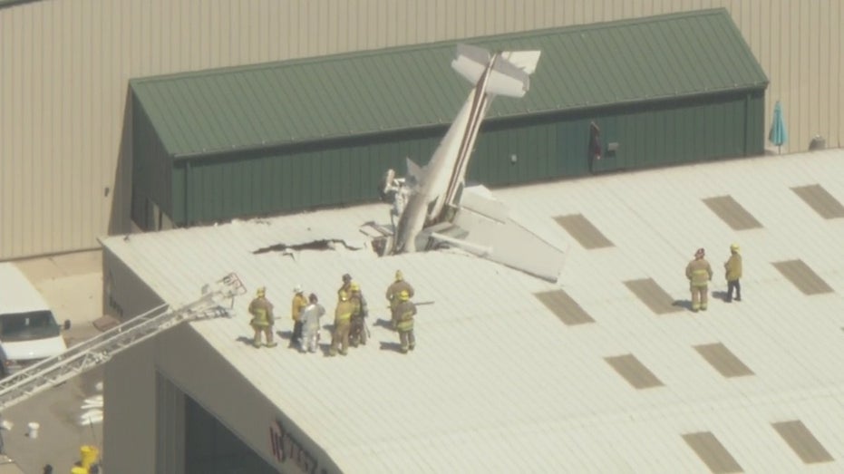 Small plane crashes into Southern California airport roof, buried nose first