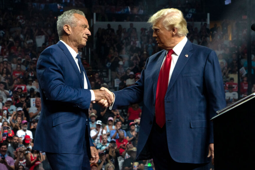 GLENDALE, ARIZONA - AUGUST 23: Former Republican presidential candidate Robert F. Kennedy Jr. and Republican presidential nominee, former U.S. President Donald Trump shake hands during a campaign rally at Desert Diamond Arena on August 23, 2024 in Glendale, Arizona. Kennedy announced today that he was suspending his presidential campaign and supporting former President Trump. (Photo by Rebecca Noble/Getty Images)