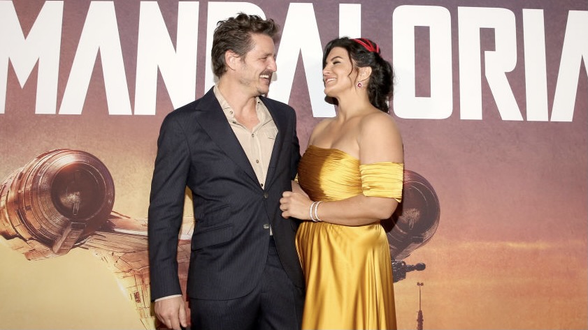 HOLLYWOOD, CALIFORNIA - NOVEMBER 13: Pedro Pascal and Gina Carano arrive at the premiere of Lucasfilm's first-ever, live-action series, 