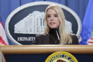 Pam Bondi speaks at the Department of Justice.