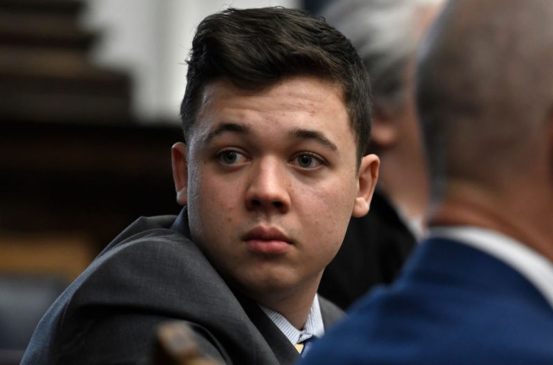 KENOSHA, WISCONSIN - NOVEMBER 17: Kyle Rittenhouse looks back as attorneys discuss items in the motion for mistrial presented by his defense during his trial at the Kenosha County Courthouse on November 17, 2021 in Kenosha, Wisconsin. Rittenhouse is accused of shooting three demonstrators, killing two of them, during a night of unrest that erupted in Kenosha after a police officer shot Jacob Blake seven times in the back while being arrested in August 2020. Rittenhouse, from Antioch, Illinois, was 17 at the time of the shooting and armed with an assault rifle. He faces counts of felony homicide and felony attempted homicide. (Photo by Sean Krajacic - Pool/Getty Images)