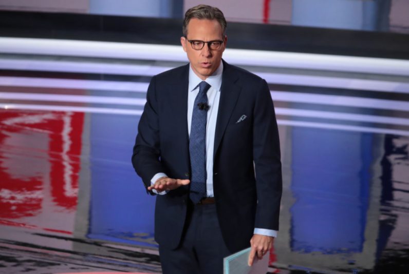 DETROIT, MICHIGAN - JULY 31: CNN moderator Jake Tapper speaks to the crowd attending the Democratic Presidential Debate at the Fox Theatre July 31, 2019 in Detroit, Michigan. 20 Democratic presidential candidates were split into two groups of 10 to take part in the debate sponsored by CNN held over two nights at Detroit’s Fox Theatre. (Photo by Scott Olson/Getty Images)
