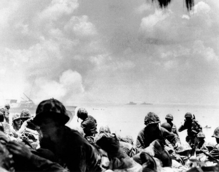 American Marines on a Saipan beach, June 1944 The first wave of Marines from the 2nd Division of the U.S. Marine Corps reached a beach of the island of Saipan (Marianas, central Pacific), June 15, 1944. At left: a Buffalo caterpillar amphibious vehicle. (Photo by: Photo12/Universal Images Group via Getty Images)