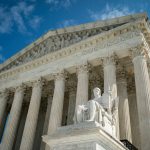 WASHINGTON, DC - SEPTEMBER 28: The Guardian or Authority of Law, created by sculptor James Earle Fraser, rests on the side of the U.S. Supreme Court on September 28, 2020 in Washington, DC. This week Seventh U.S. Circuit Court Judge Amy Coney Barrett, U.S. President Donald Trump's nominee to the Supreme Court, will begin meeting with Senators as she seeks to be confirmed before the presidential election. (Photo by Al Drago/Getty Images)