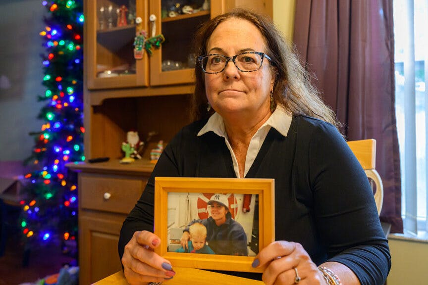Cari Scribner with photos of her son, Nickolas, on Thursday, July 31, 2025, in her home Ballston Spa, NY. 