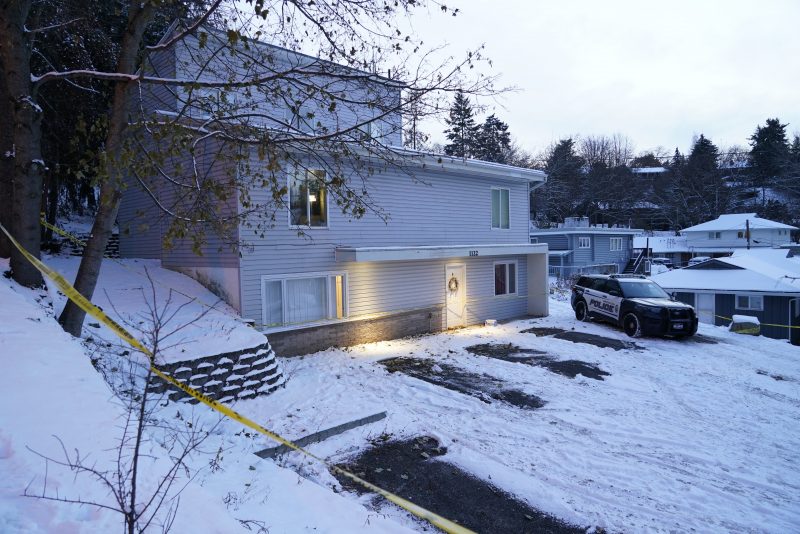 Bare spots are seen on Tuesday, Nov. 29, 2022, in the snowy parking lot in front of the home where four University of Idaho students were found dead on Nov. 13, 2022 in Moscow, Idaho, after vehicles belonging to the victims and others were towed away earlier in the day. The university will be holding a system-wide vigil on Wednesday evening, Nov. 30, 2022, in memory of the students, as investigators continue to look for a suspect and motive in the killings. (AP Photo/Ted S. Warren)