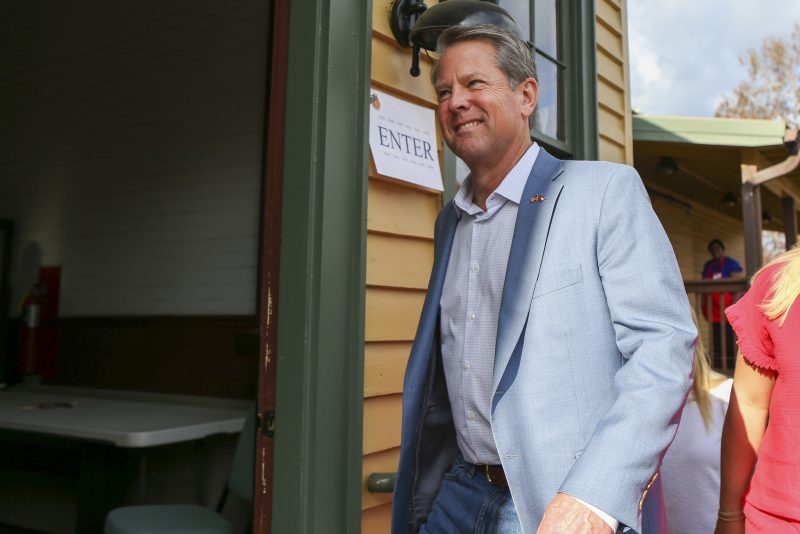 Republican candidate for Georgia Governor Gov. Brian Kemp arrives to vote Tuesday, Nov. 8, 2022 in Winterville, Ga. (AP Photo/Brett Davis)