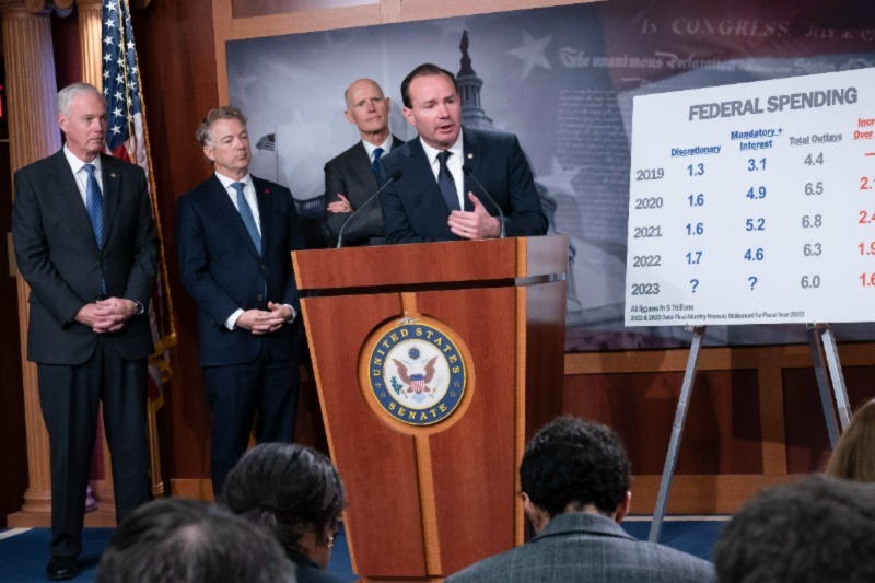 A group of Republican senators, from left, Sen. Ron Johnson, R-Wis., Sen. Rand Paul, R-Ky., Sen. Rick Scott, R-Fla., and Sen. Mike Lee, R-Utah, criticize Democratic spending and the current process to fund the government, during a news conference at the Capitol in Washington, Wednesday, Dec. 14, 2022. (AP Photo/J. Scott Applewhite)