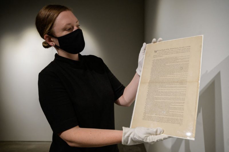 A page of the first printing of the United States Constitution is displayed at the offices of Sotheby's auction house in New York on September 17, 2021. - An 'incredibly rare' first printing of the US Constitution will be put for auction by Sotheby's New York, for an estimate of $15 to $20 million. It is one of the only 11 copies known to exist and the only one in private hands. (Photo by Ed JONES / AFP) (Photo by ED JONES/AFP via Getty Images)