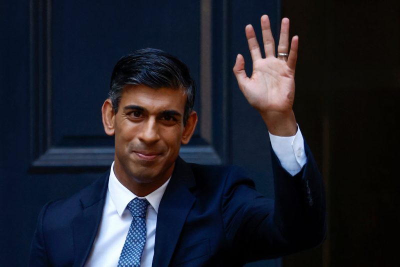 LONDON, ENGLAND - OCTOBER 24: New Conservative Party leader and incoming prime minister Rishi Sunak waves as he departs Conservative Party Headquarters on October 24,2022 in London, England. Rishi Sunak was appointed as Conservative leader and the UK's next Prime Minister after he was the only candidate to garner 100-plus votes from Conservative MPs in the contest for the top job. (Photo by Jeff J Mitchell/Getty Images)