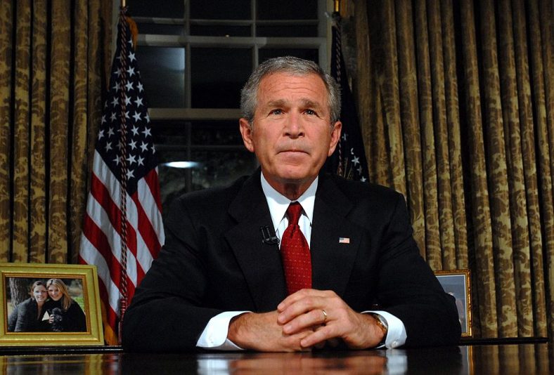 WASHINGTON - SEPTEMBER 11:  (AFP OUT) U.S. President George W. Bush sits at his desk in the Oval Office of the White House after addressing the nation on the anniversary of the 2001 terrorist attacks September 11, 2006 in Washington, DC.   It's been five years since terrorists seized four airliners in flight, crashing two in the World Trade Center in New York, one into the Pentagon in Arlington, Virginia and one into a field in Shanksville, Pennsylvania.  (Photo by Roger L. Wollenberg-Pool/Getty Images)
