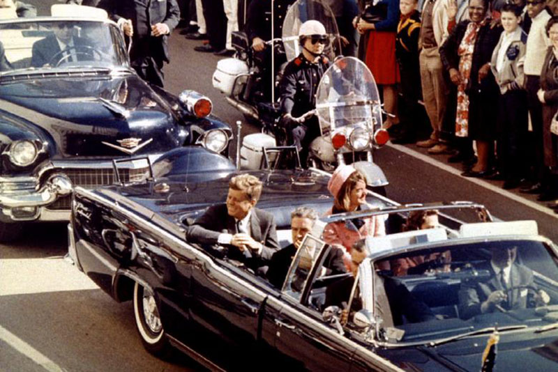 President John F. Kennedy, First Lady Jacqueline Kennedy and Texas Governor John Connally ride in a limousine moments before Kennedy was assassinated, in Dallas, Texas November 22, 1963. Walt Cisco/Dallas Morning News/Handout/File Photo via REUTERS