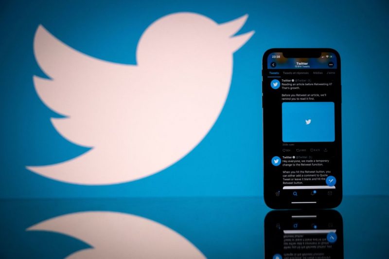 This photograph taken on October 26, 2020 shows the logo of US social network Twitter displayed on the screen of a smartphone and a tablet in Toulouse, southern France. (Photo by Lionel BONAVENTURE / AFP) (Photo by LIONEL BONAVENTURE/AFP via Getty Images)