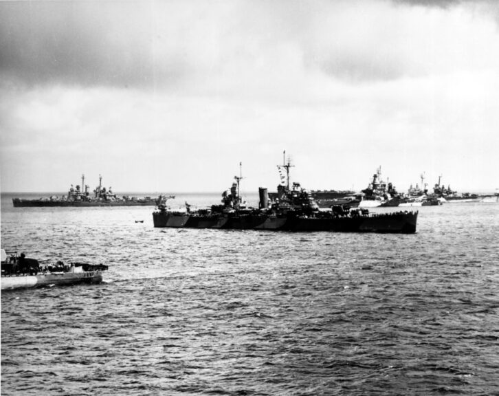 National Archives. Saipan Operation, June 1944. Caption: Ship of task force 52 prepare to depart Roi for Saipan, 12 June 1944. Seen from NEW MEXICO These ships are (left to right): USS McNAIR (DD-679); USS MONTPELIER (CL-57); USS HONOLULU (CL-48); USS TENNESSEE (BB-43). Catalog #: 80-G-253678. National Archives. Courtesy: Naval History and Heritage Command.