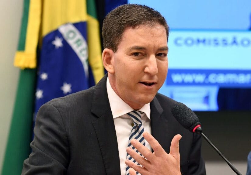 US journalist Glenn Greenwald, founder and editor of The Intercept website gestures during a hearing at the Lower House's Human Rights Commission in Brasilia, Brazil, on June 25, 2019. - The Intercept has been publishing alleged conversations between Justice Minister and former judge Sergio Moro and prosecutors of Operation Lava Jato, which would have been hacked from their mobile phones. (Photo by EVARISTO SA / AFP) (Photo by EVARISTO SA/AFP via Getty Images)