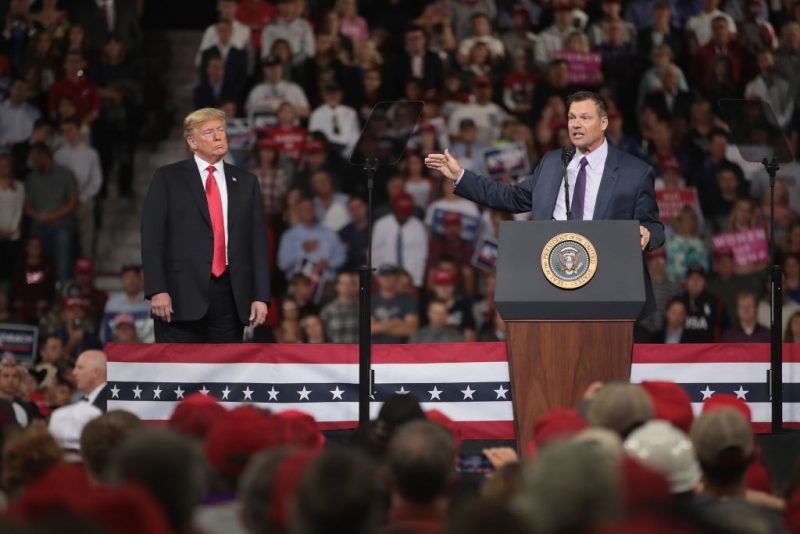 Republican candidate for governor of Kansas Kris Kobach speaks at a rally with President Donald Trump at the Kansas Expocenter on October 6, 2018 in Topeka, Kansas. Trump scored a political victory today when Judge Brett Kavanaugh was confirmed by the Senate to become the next Supreme Court justice. (Photo by Scott Olson/Getty Images)