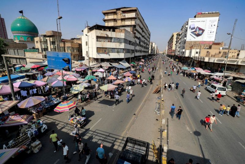 People walk and shop at the Shorja market in the centre of Iraq's capital Baghdad on October 7, 2022. (Photo by AHMAD AL-RUBAYE / AFP) (Photo by AHMAD AL-RUBAYE/AFP via Getty Images)
