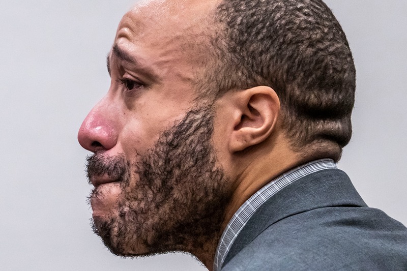 Defendant Darrell Brooks fights back tears as he makes his opening statement to the jury during his trial in a Waukesha County Circuit Court in Waukesha, Wis., on Thursday, Oct. 20, 2022. Brooks, who is representing himself during the trial, is charged with driving into a Waukesha Christmas Parade last year, killing six people and injuring dozens more. (Scott Ash/Milwaukee Journal-Sentinel via AP, Pool)